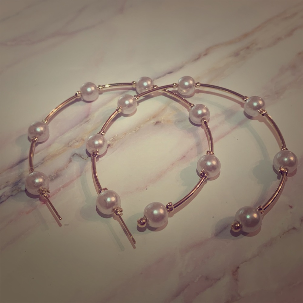 Gold hoop earrings with pearls